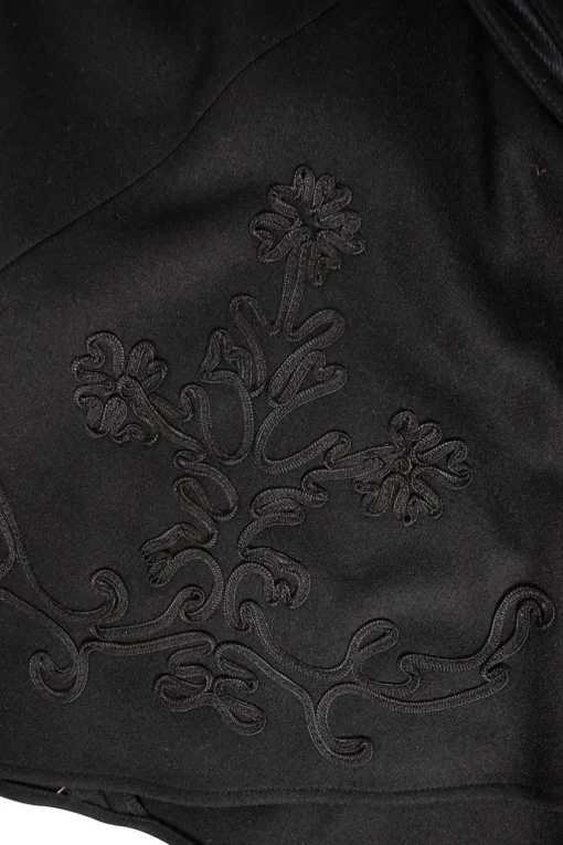 Tara Jarmon black wool flared skirt with flower embroidery. SIde button up