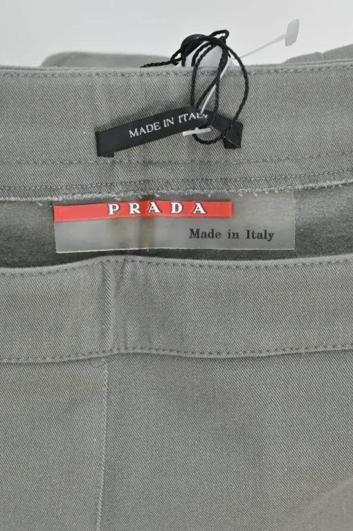 Taupe grey cotton-blend pull-on mid-rise slacks with zip detail along cuffs
