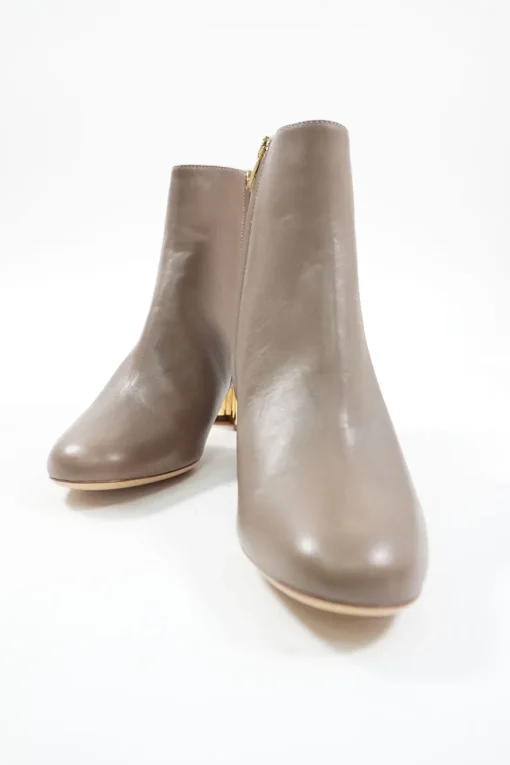Taupe polished calfskin almond toe zip-up ankle booties with scalloped block heel
