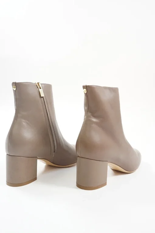Taupe polished calfskin almond toe zip-up ankle booties with scalloped block heel