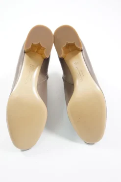 Taupe polished calfskin almond toe zip-up ankle booties with scalloped block heel