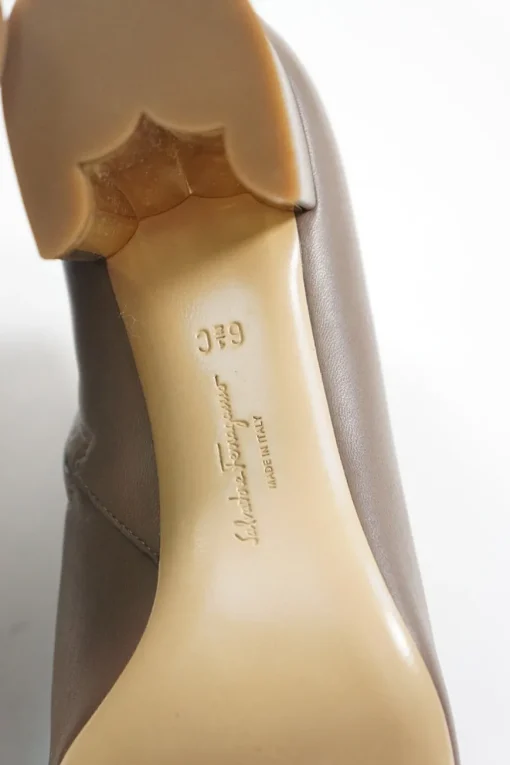 Taupe polished calfskin almond toe zip-up ankle booties with scalloped block heel