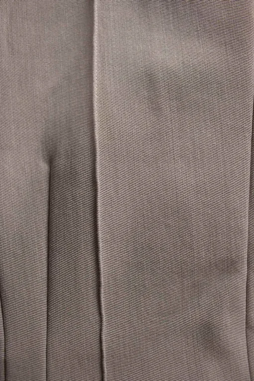 Taupe polyester-wool blend crêpe darted pintuck trousers with fold over hem