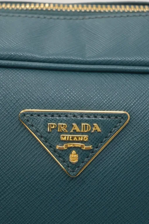 Teal Saffiano leather Vitello Daino rectangle bowler bag with detachable shoulder strap