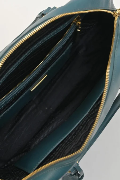 Teal Saffiano leather Vitello Daino rectangle bowler bag with detachable shoulder strap