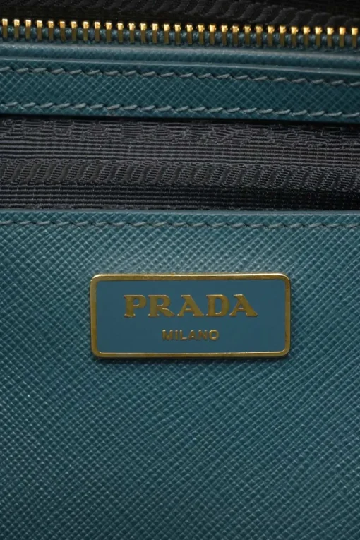 Teal Saffiano leather Vitello Daino rectangle bowler bag with detachable shoulder strap