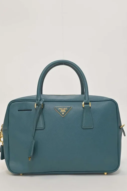 Teal Saffiano leather Vitello Daino rectangle bowler bag with detachable shoulder strap