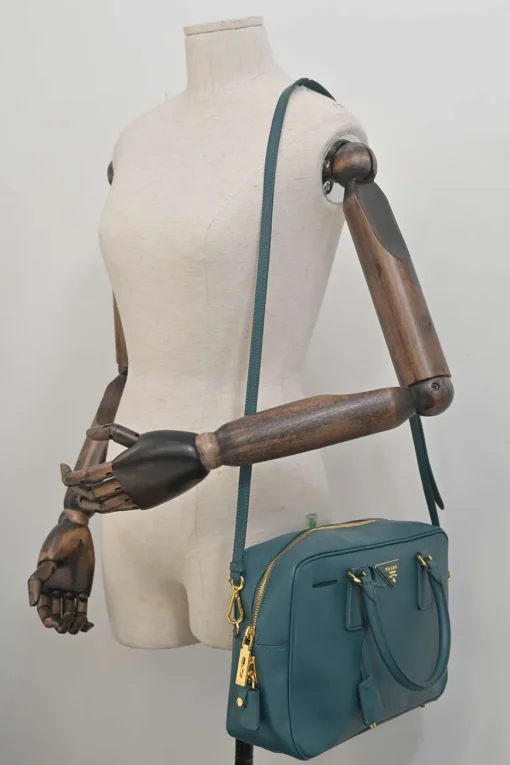 Teal Saffiano leather Vitello Daino rectangle bowler bag with detachable shoulder strap