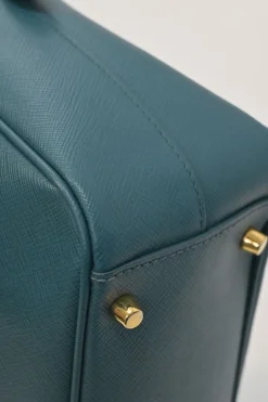 Teal Saffiano leather Vitello Daino rectangle bowler bag with detachable shoulder strap