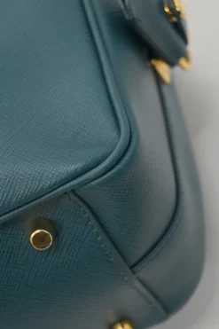 Teal Saffiano leather Vitello Daino rectangle bowler bag with detachable shoulder strap