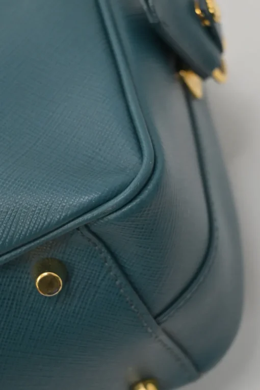 Teal Saffiano leather Vitello Daino rectangle bowler bag with detachable shoulder strap