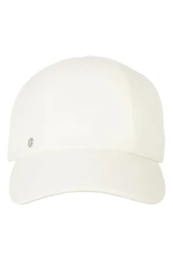 'Tess Cap' in off white cotton canvas with interior "Quadrige" badge and adjustment tab with two polished palladium plated Clou de Selle details