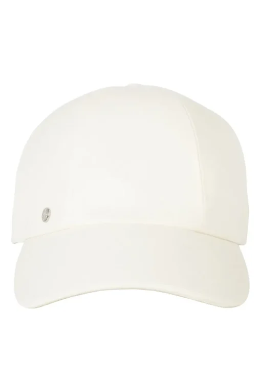 'Tess Cap' in off white cotton canvas with interior "Quadrige" badge and adjustment tab with two polished palladium plated Clou de Selle details