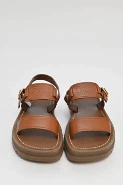 Tobacco vegetable-tanned calfskin and rubber Clea Triomphe slingback sandals with buckle fastening