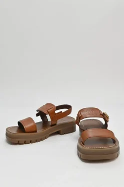 Tobacco vegetable-tanned calfskin and rubber Clea Triomphe slingback sandals with buckle fastening