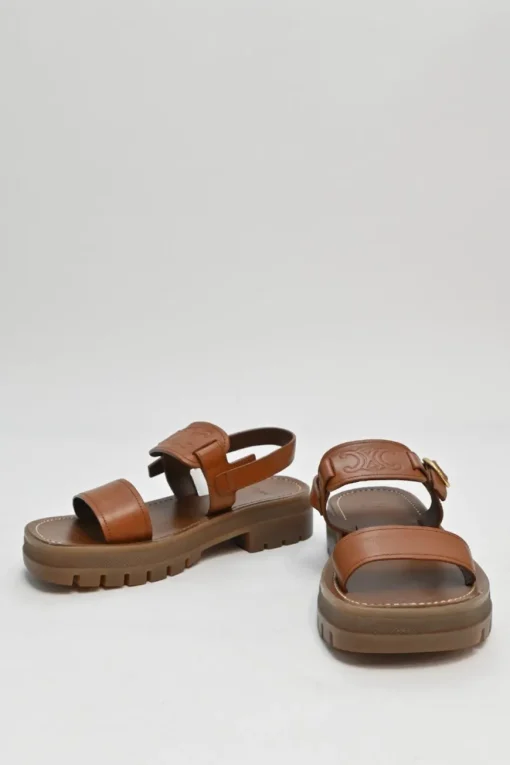 Tobacco vegetable-tanned calfskin and rubber Clea Triomphe slingback sandals with buckle fastening