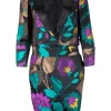 Two piece jacket &amp; skirt suit in silk blend in black with flower jacquard pattern. Cropped single button jacket with small patch pockets