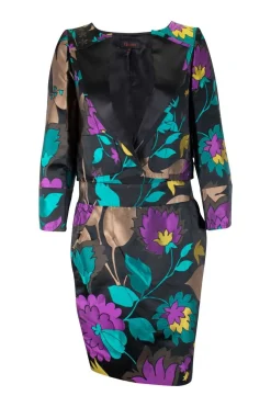 Two piece jacket &amp; skirt suit in silk blend in black with flower jacquard pattern. Cropped single button jacket with small patch pockets