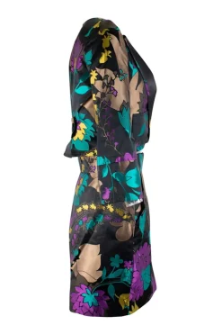 Two piece jacket &amp; skirt suit in silk blend in black with flower jacquard pattern. Cropped single button jacket with small patch pockets