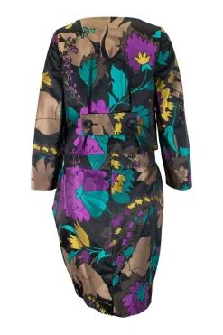 Two piece jacket &amp; skirt suit in silk blend in black with flower jacquard pattern. Cropped single button jacket with small patch pockets