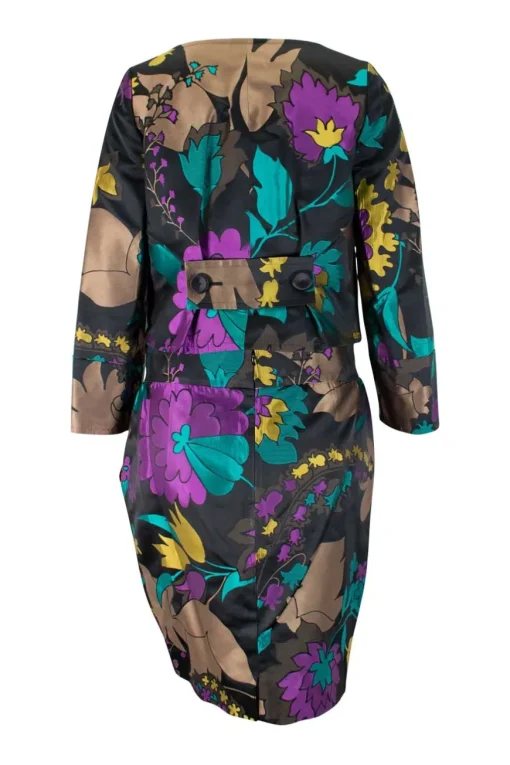 Two piece jacket &amp; skirt suit in silk blend in black with flower jacquard pattern. Cropped single button jacket with small patch pockets