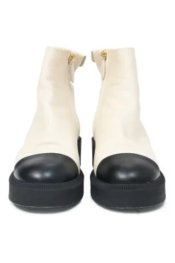 Two-tone calfskin leather logo ankle boots with contrasting leather toe cap and soles