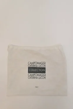 Two-tone canvas and leather frame shoulder bag with metallic push-lock closure