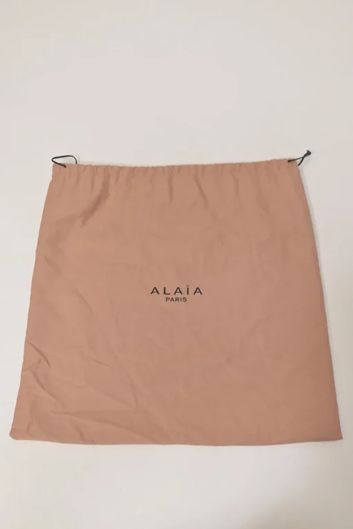 Two-tone laser-cut leather shopper tote with detachable shoulder strap