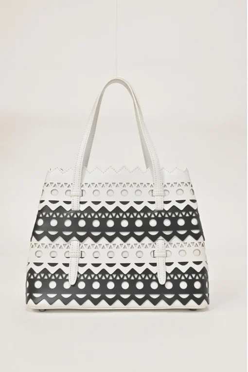 Two-tone laser-cut leather shopper tote with detachable shoulder strap