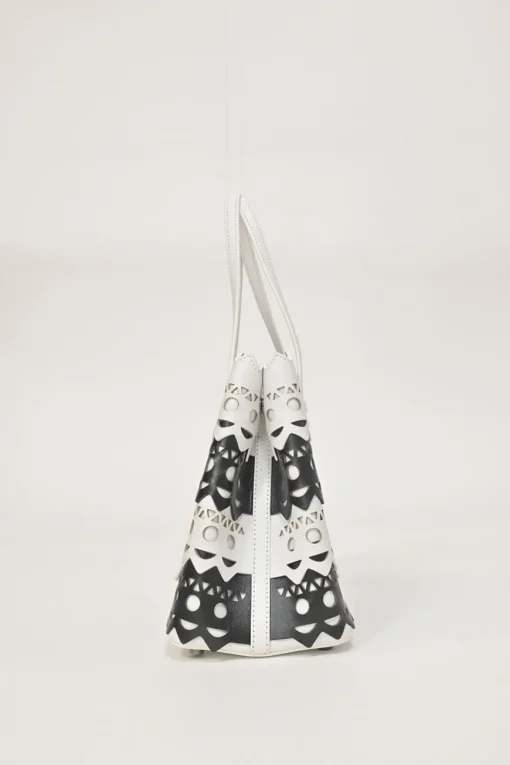 Two-tone laser-cut leather shopper tote with detachable shoulder strap