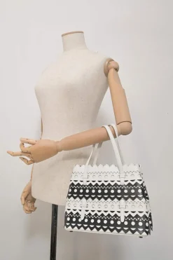 Two-tone laser-cut leather shopper tote with detachable shoulder strap