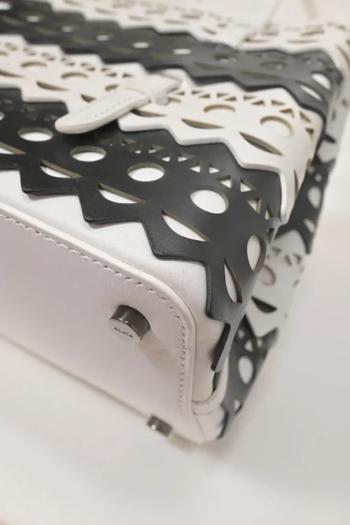 Two-tone laser-cut leather shopper tote with detachable shoulder strap