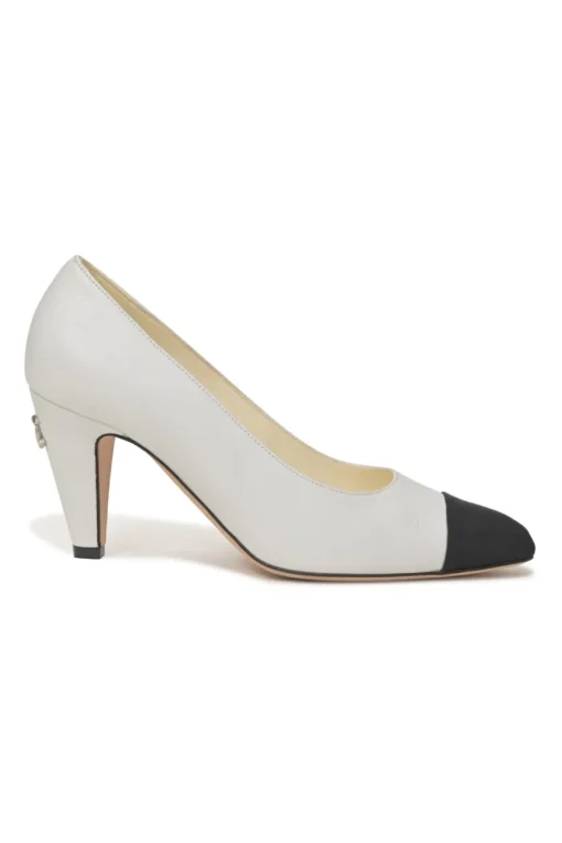 Two-tone leather and grosgrain pointed-toe cone heel pumps featuring metallic Coco Mark plaque appliqué
