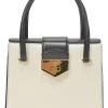Two-tone leather top handle bag with turnlock fastening