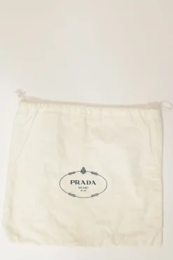 Two-tone leather top handle bag with turnlock fastening