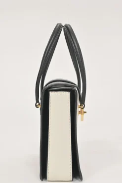 Two-tone leather top handle bag with turnlock fastening
