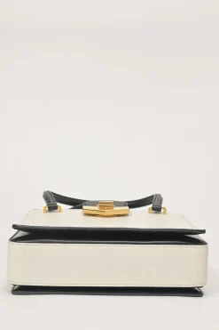 Two-tone leather top handle bag with turnlock fastening