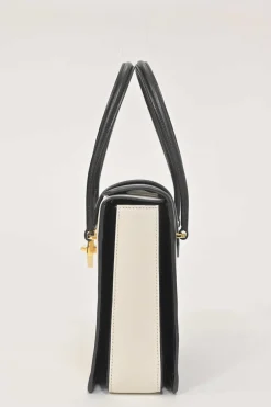 Two-tone leather top handle bag with turnlock fastening