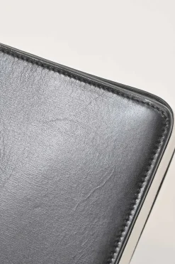 Two-tone leather top handle bag with turnlock fastening