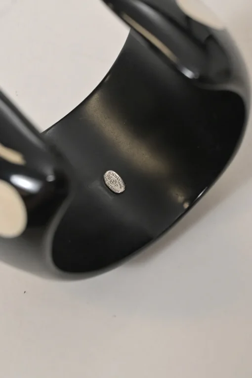 Two-tone resin and metal Coco Mark polka dot bangle