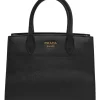 Two-tone Saffiano leather Bibliotheque bag with detachable black and white flower applique shoulder strap