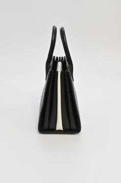 Two-tone Saffiano leather Bibliotheque bag with detachable black and white flower applique shoulder strap
