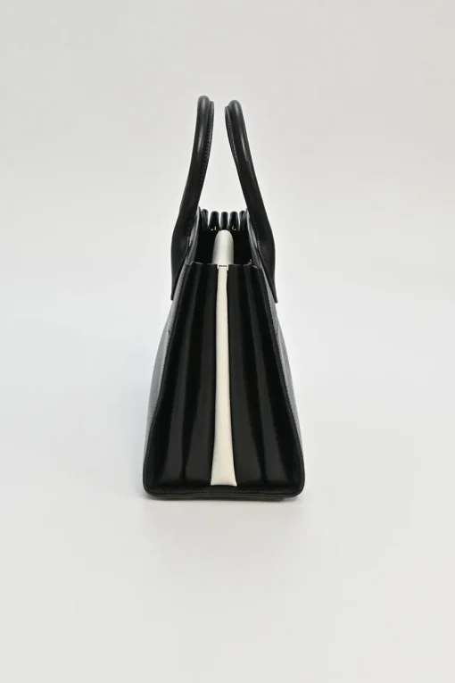 Two-tone Saffiano leather Bibliotheque bag with detachable black and white flower applique shoulder strap