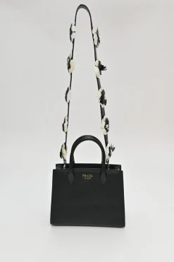 Two-tone Saffiano leather Bibliotheque bag with detachable black and white flower applique shoulder strap