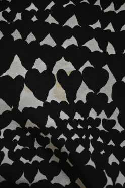 Two-tone silk abstract heart print pull-on crop-crotch tapered leg trousers with elasticated waistband