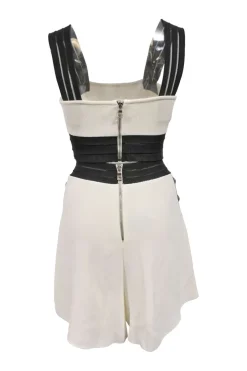 Two-tone viscose-blend interlock knit two-piece set featuring square-neck bustier top and high-rise tuck-pleat wide-leg shorts