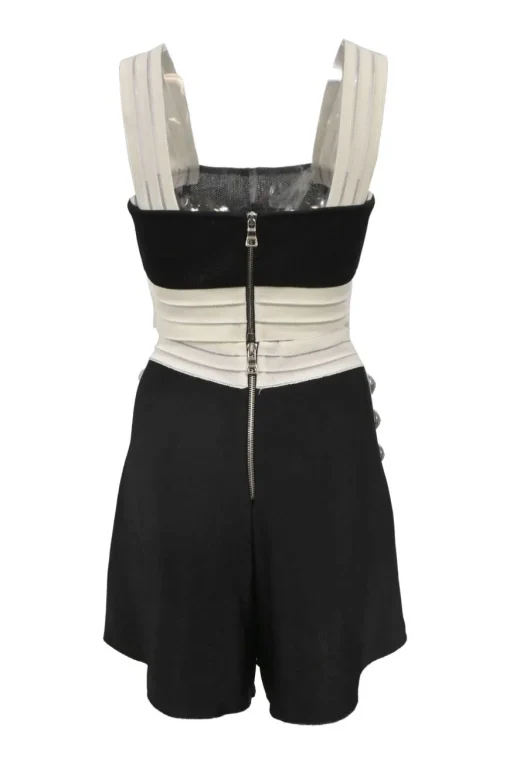 Two-tone viscose-blend interlock knit two-piece set featuring square-neck bustier top and high-rise tuck-pleat culotte shorts