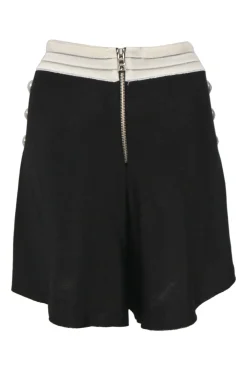 Two-tone viscose-blend interlock knit two-piece set featuring square-neck bustier top and high-rise tuck-pleat culotte shorts