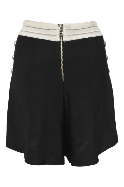 Two-tone viscose-blend interlock knit two-piece set featuring square-neck bustier top and high-rise tuck-pleat culotte shorts