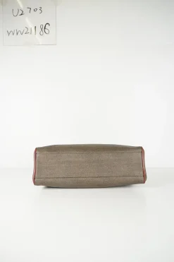 Vintage Fendi print canvas top handle bag with camel leather trimmings. Flap with turn lock fastening. Two main compartments lined in leather, one with zip pocket. Removable shoulder strap